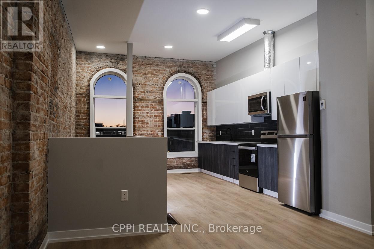 216 - 140 Simcoe Street, Peterborough Central (North), Ontario  K9H 2H5 - Photo 3 - X12050592