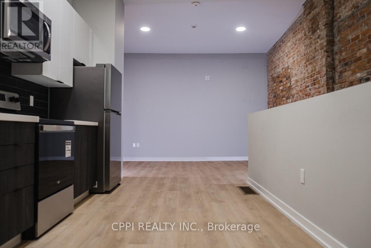 216 - 140 Simcoe Street, Peterborough Central (North), Ontario  K9H 2H5 - Photo 5 - X12050592