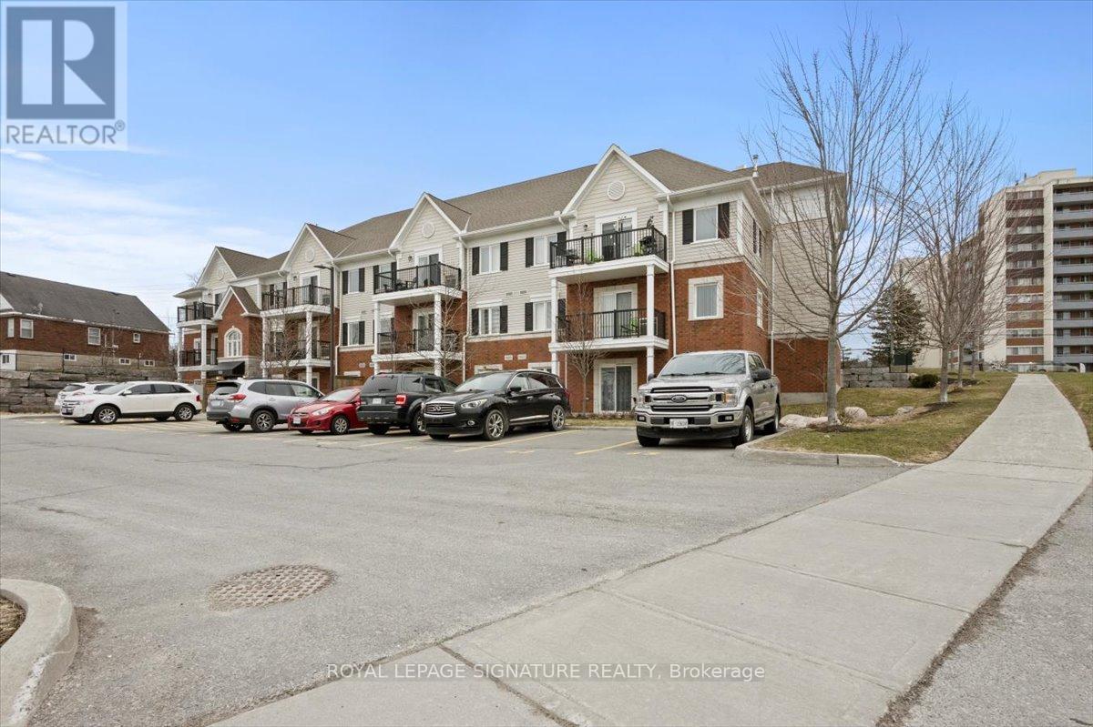 201 - 930 Wentworth Street, Peterborough West (Central), Ontario  K9J 8R8 - Photo 2 - X12077004