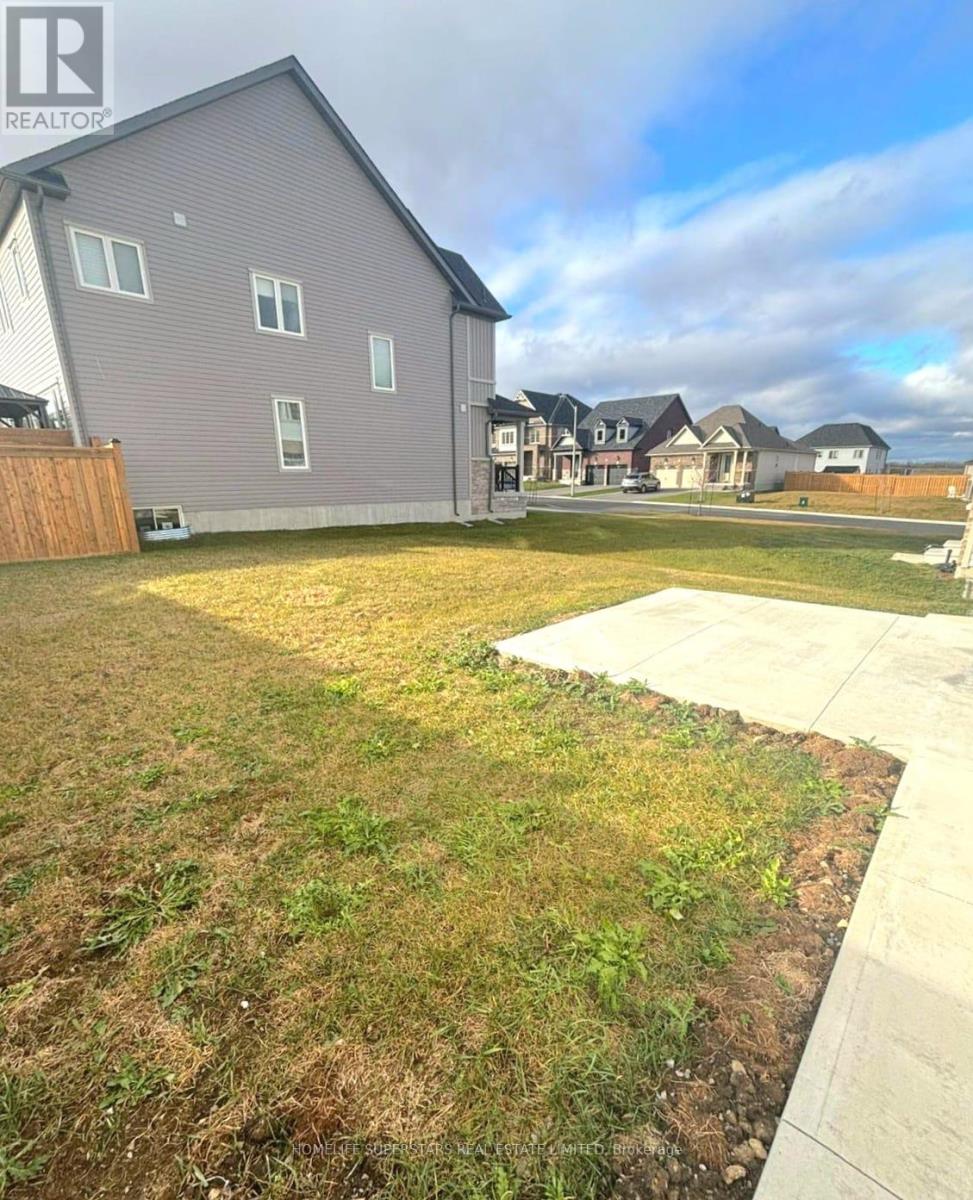 9 Hennessey Crescent, Kawartha Lakes (Lindsay), Ontario  K9V 0P2 - Photo 4 - X12094479