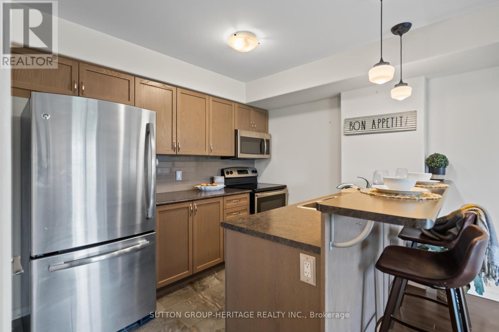 107 - 312 Spillsbury Drive, Peterborough West (South), Ontario  K9K 0B6 - Photo 6 - X12130241