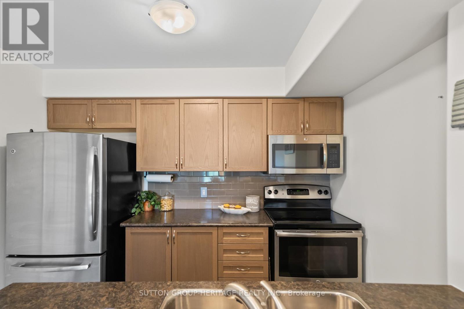 107 - 312 Spillsbury Drive, Peterborough West (South), Ontario  K9K 0B6 - Photo 7 - X12130241