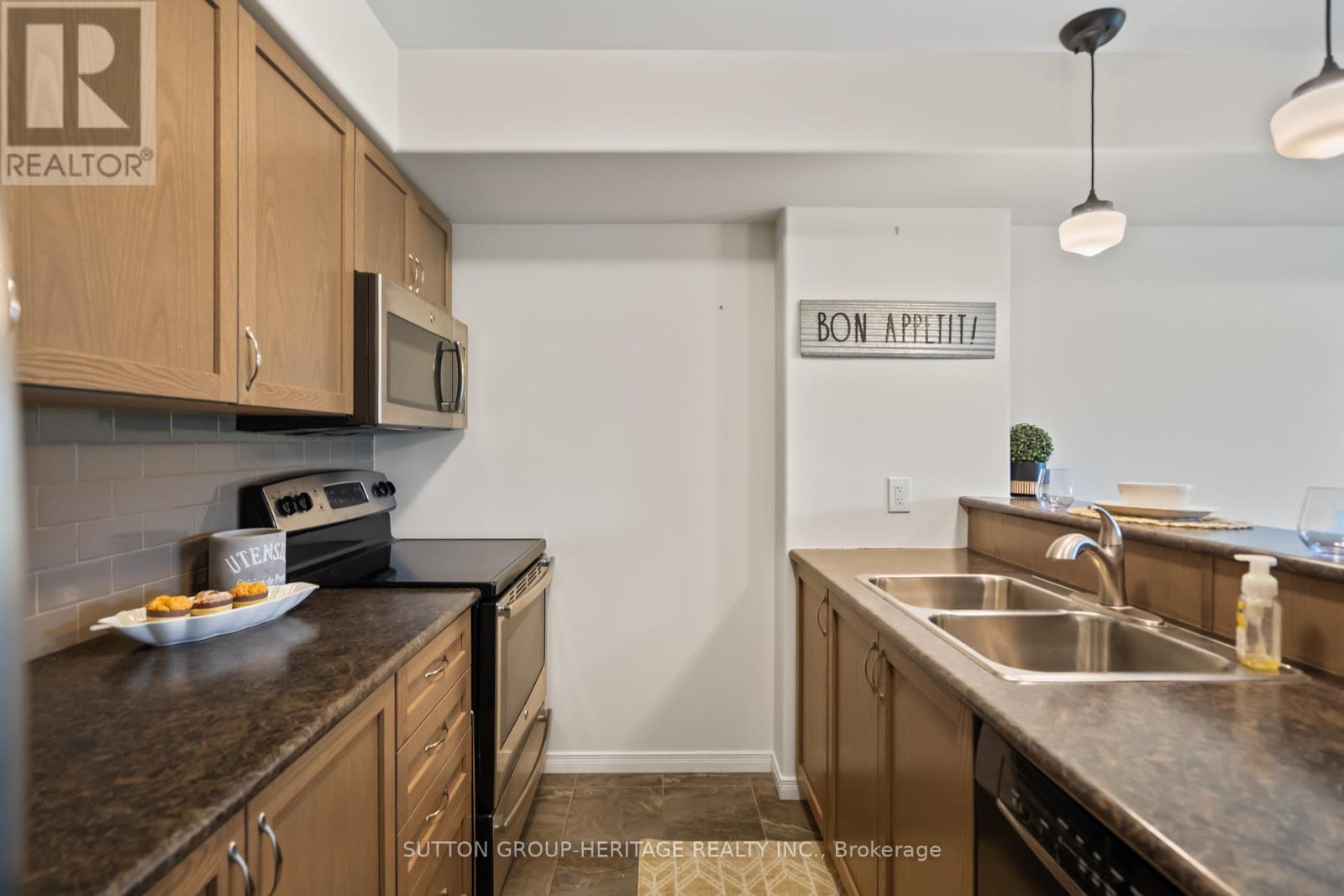 107 - 312 Spillsbury Drive, Peterborough West (South), Ontario  K9K 0B6 - Photo 8 - X12130241
