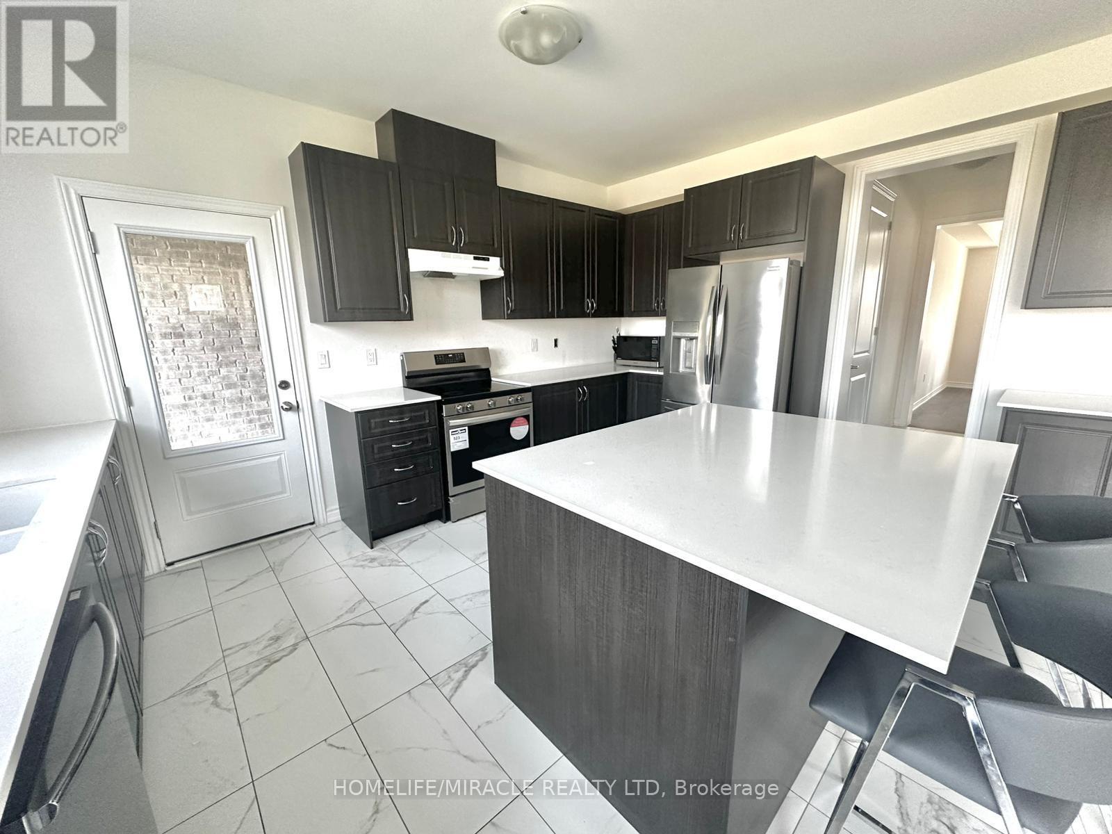 101 Golden Meadows Drive, Otonabee-South Monaghan, Ontario  K9J 0K8 - Photo 4 - X12146093