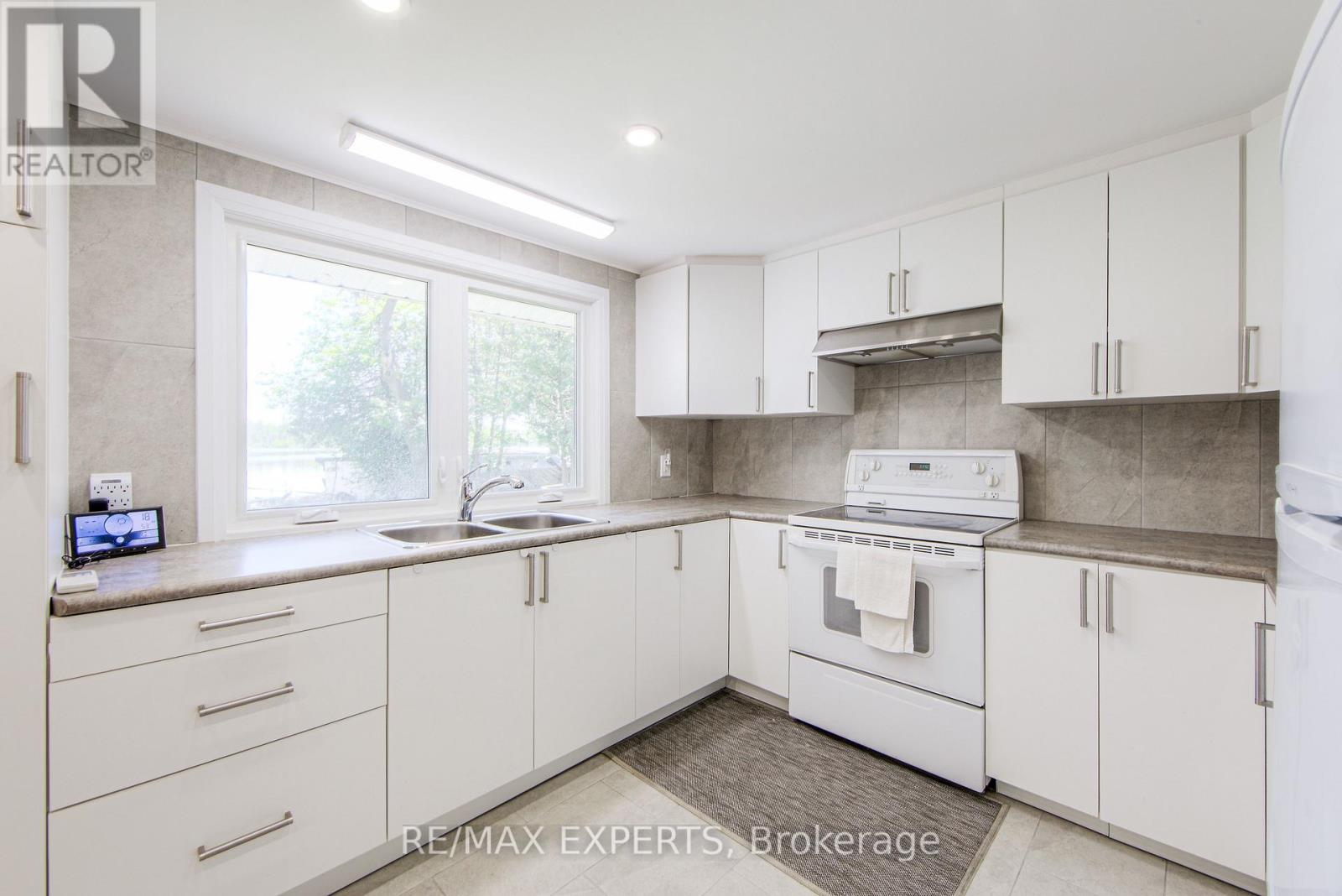 24 Riverside Drive, Kawartha Lakes (Ops), Ontario  K9V 0H6 - Photo 28 - X12175758