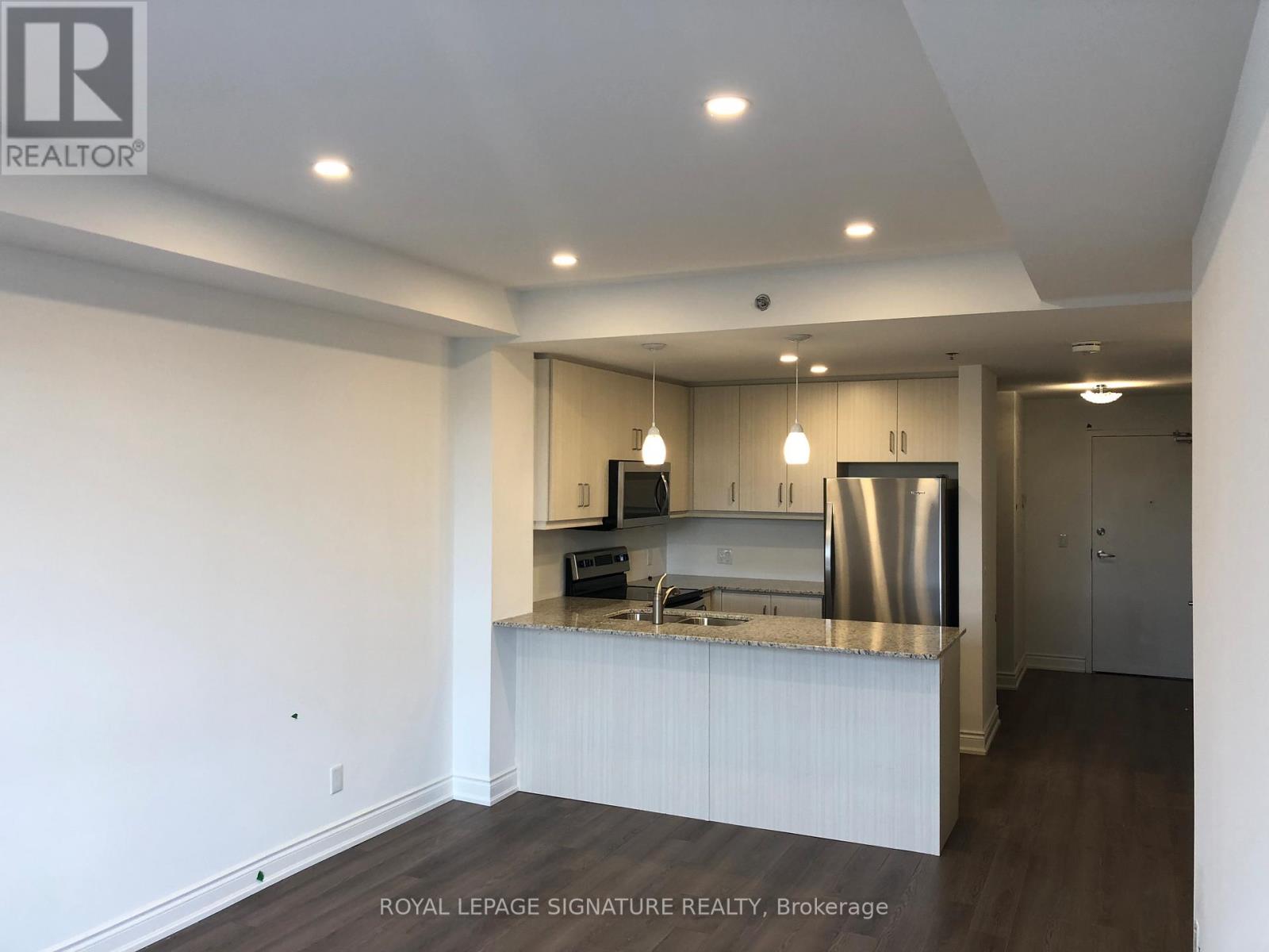 321 - 21 Brookhouse Drive, Clarington (Newcastle), Ontario  L1B 0V4 - Photo 2 - E12186330