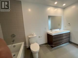 409 - 195 Hunter Street, Peterborough Central (North), Ontario  K9H 0K6 - Photo 5 - X12255634