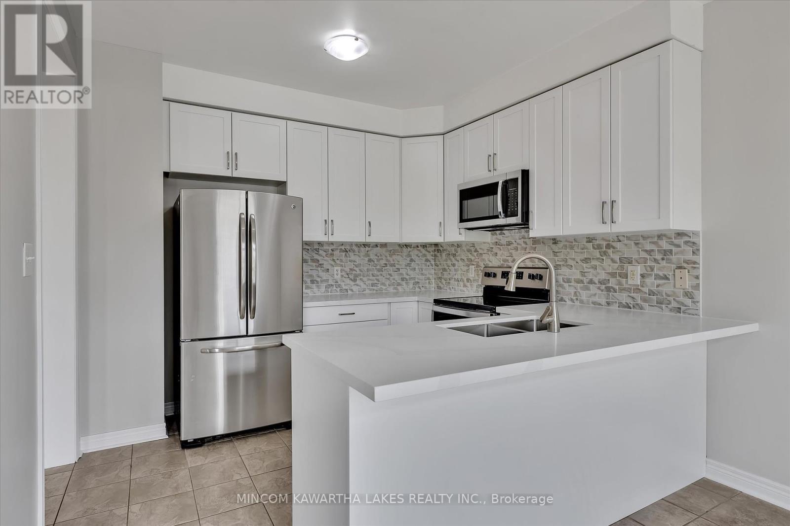 1403 Mcauliffe Lane, Peterborough East (North), Ontario  K9H 0B7 - Photo 14 - X12262318