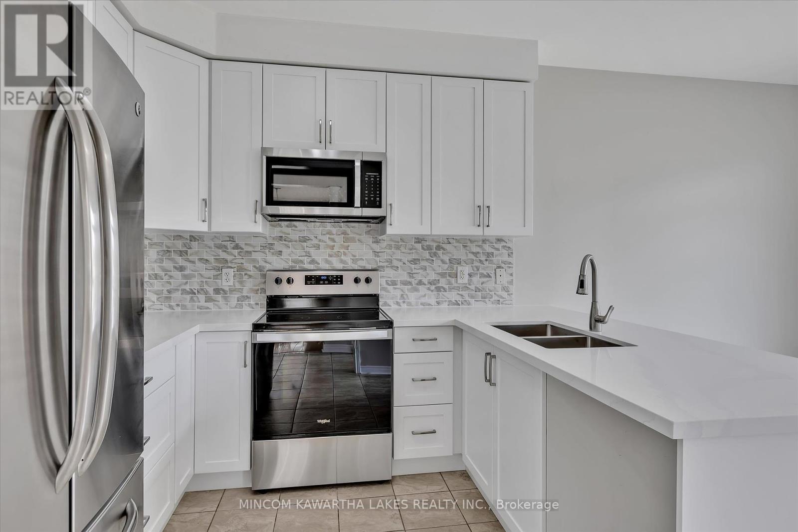 1403 Mcauliffe Lane, Peterborough East (North), Ontario  K9H 0B7 - Photo 15 - X12262318