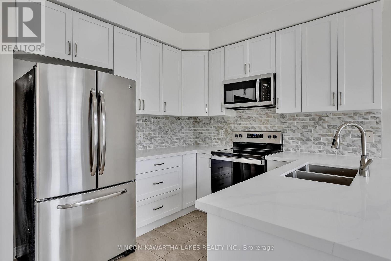 1403 Mcauliffe Lane, Peterborough East (North), Ontario  K9H 0B7 - Photo 16 - X12262318
