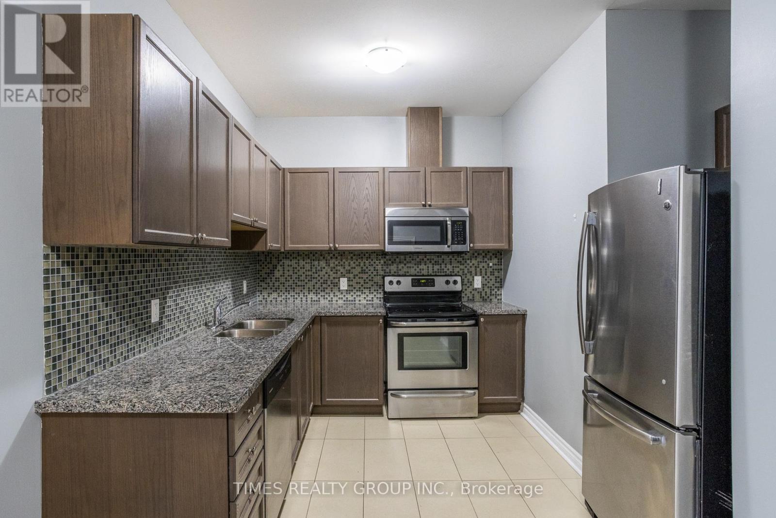 105 - 384 Rogers Street, Peterborough East (Central), Ontario  K9H 7B6 - Photo 2 - X12266968
