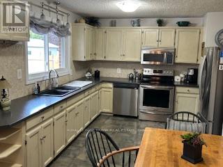 654 Mystic Crescent, Selwyn, Ontario  K0L 1T0 - Photo 4 - X12276809