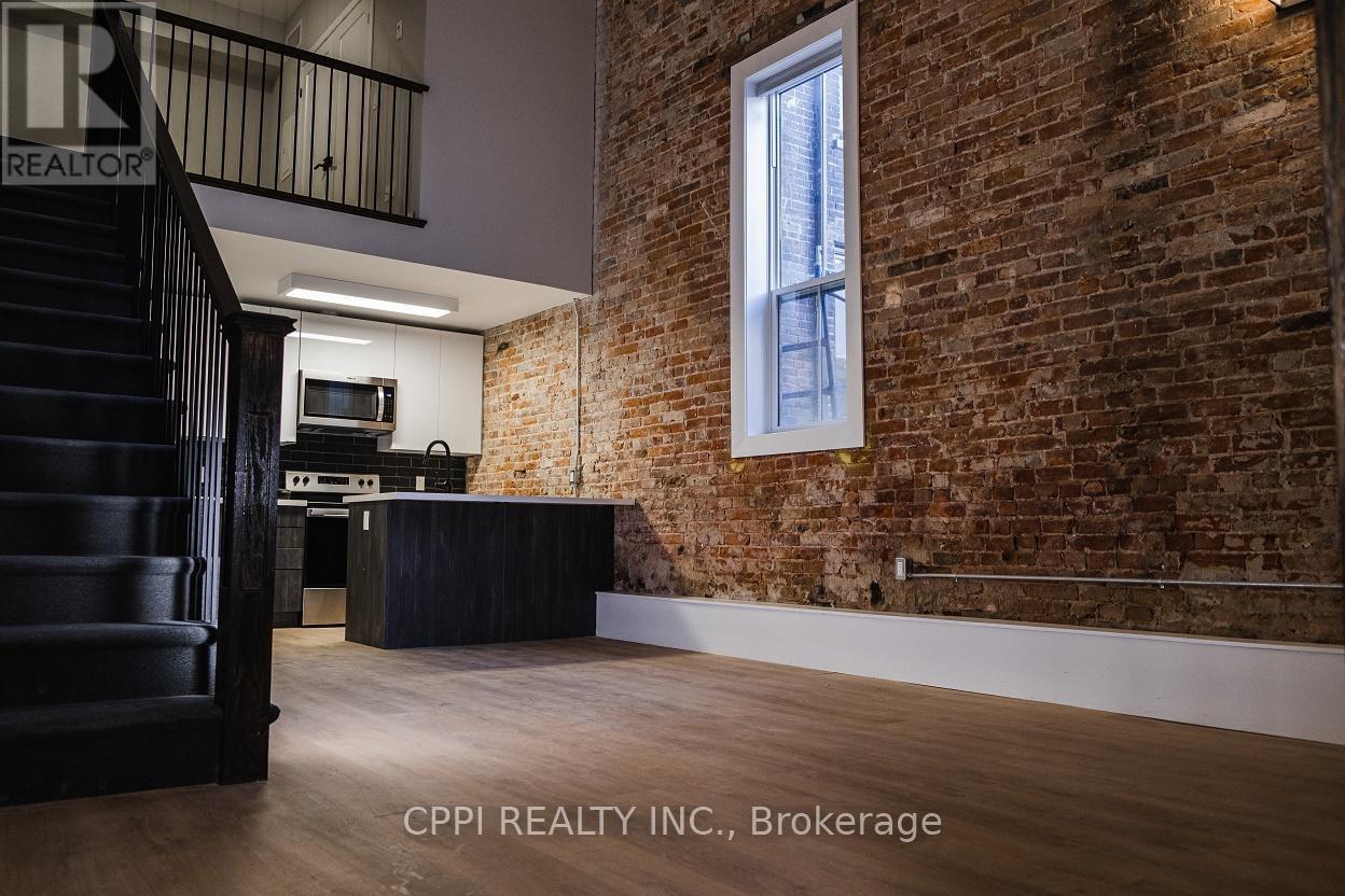 102 - 140 Simcoe Street, Peterborough Central (North), Ontario  K9H 2H5 - Photo 4 - X12305579