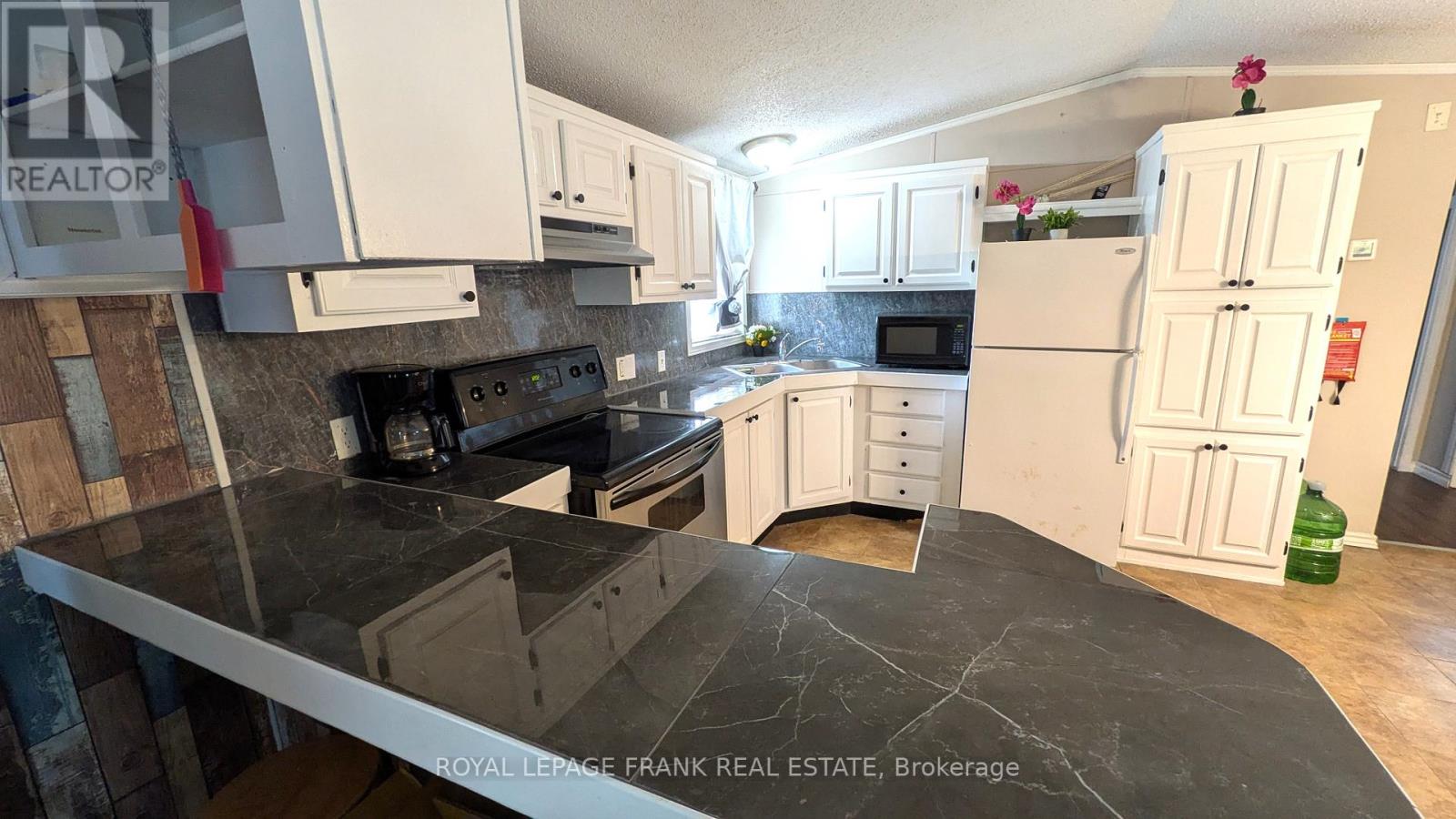 2171 St. Ola Road, Tudor And Cashel (Cashel Ward), Ontario  K0L 1W0 - Photo 7 - X12315655