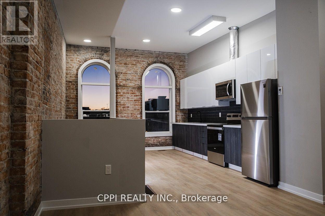 216 - 140 Simcoe Street, Peterborough Central (North), Ontario  K9H 2H5 - Photo 3 - X12356213