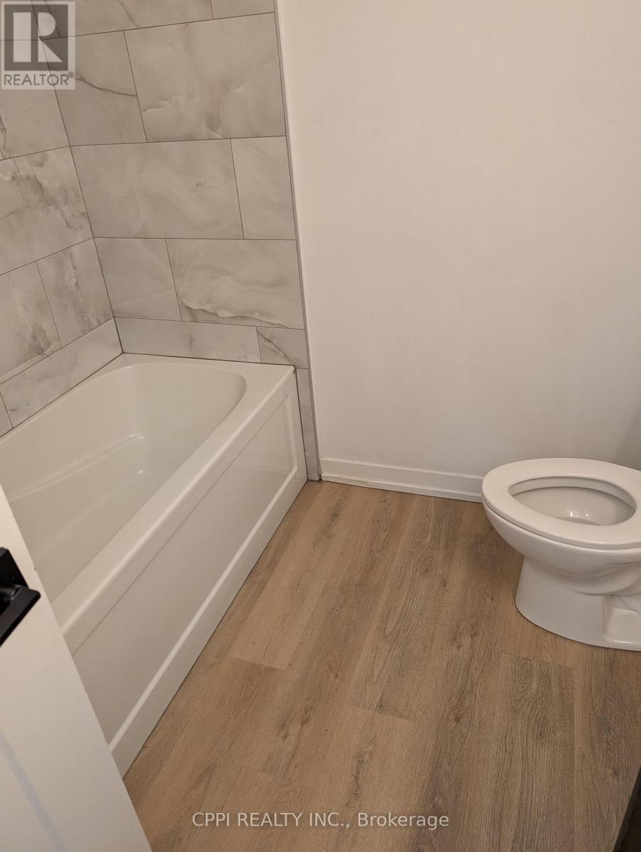 212 - 140 Simcoe Street, Peterborough Central (North), Ontario  K9H 2H5 - Photo 11 - X12356236