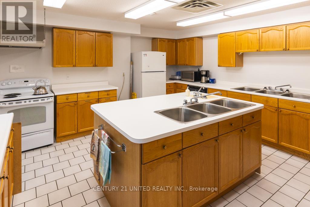 305 - 921 Armour Road, Peterborough (Ashburnham Ward 4), Ontario  K9H 7K5 - Photo 13 - X12374863