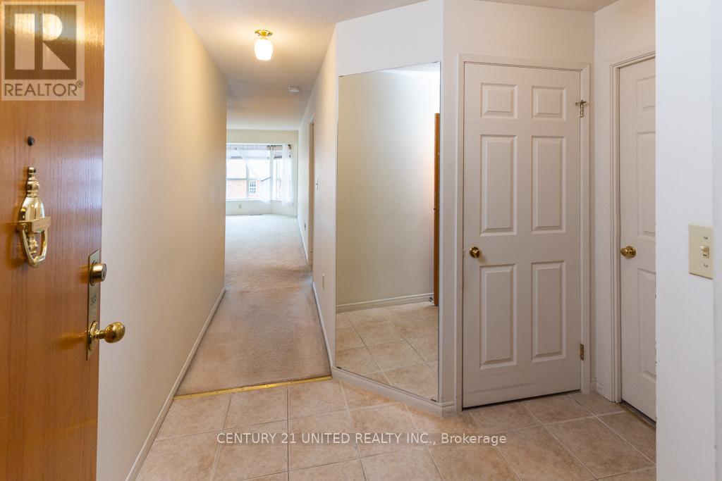 305 - 921 Armour Road, Peterborough (Ashburnham Ward 4), Ontario  K9H 7K5 - Photo 2 - X12374863