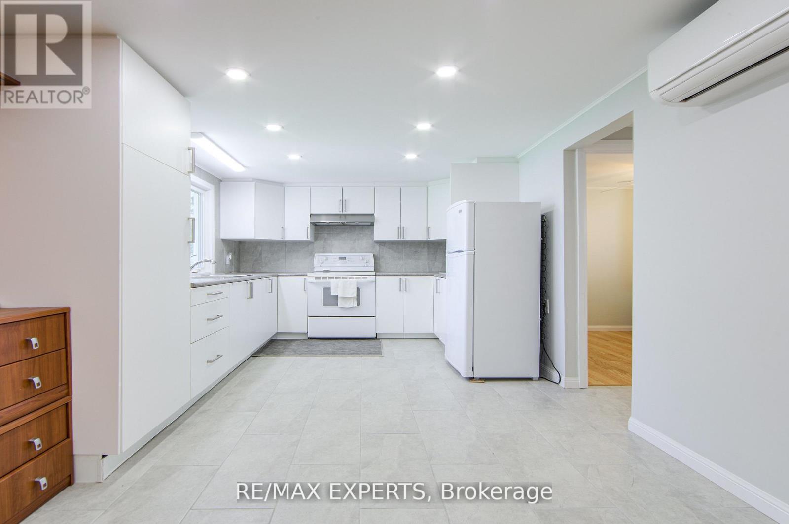 24 Riverside Drive, Kawartha Lakes (Ops), Ontario  K9V 0H6 - Photo 27 - X12419414