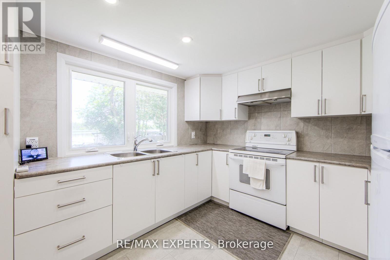 24 Riverside Drive, Kawartha Lakes (Ops), Ontario  K9V 0H6 - Photo 28 - X12419414