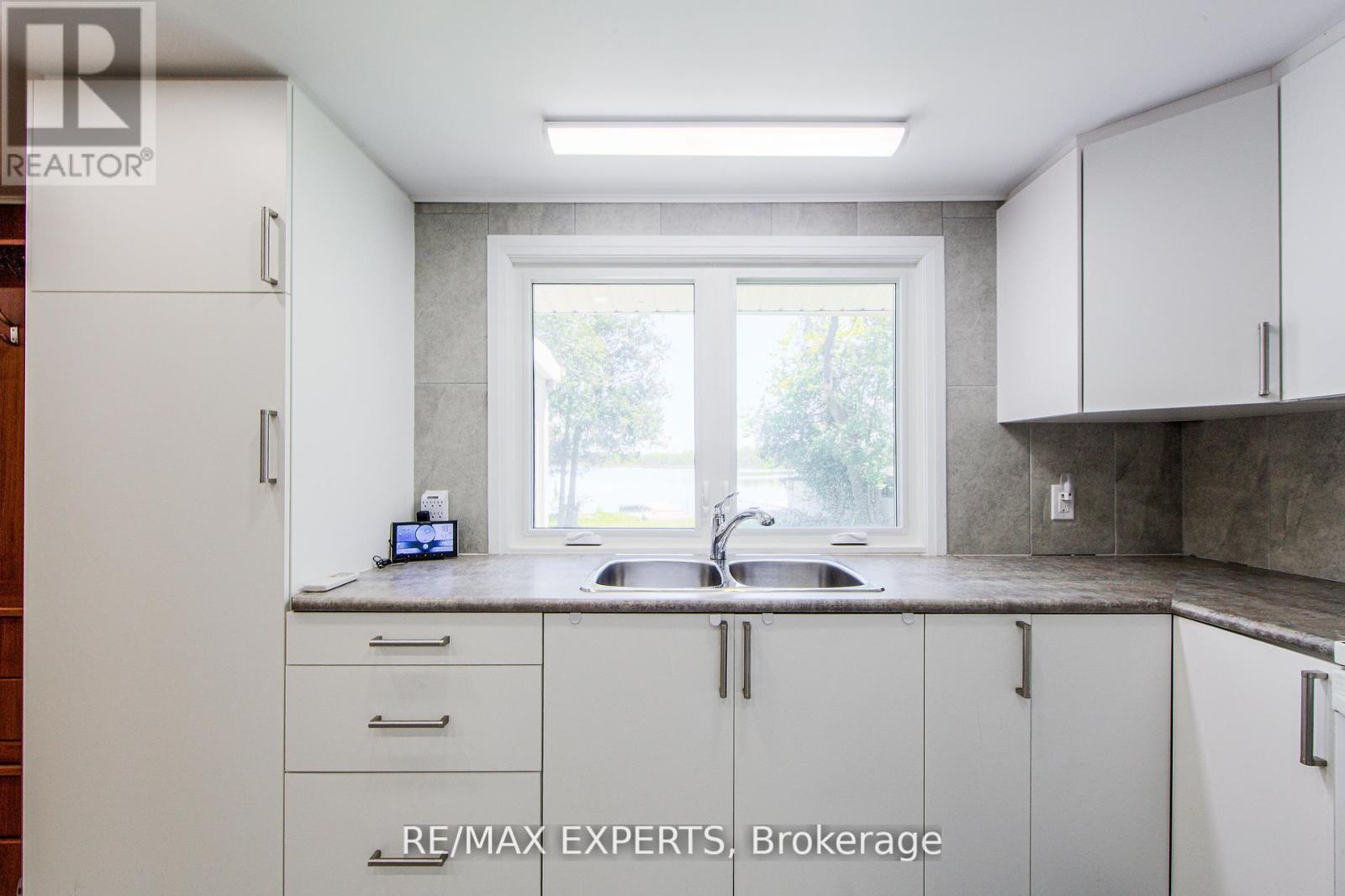 24 Riverside Drive, Kawartha Lakes (Ops), Ontario  K9V 0H6 - Photo 29 - X12419414