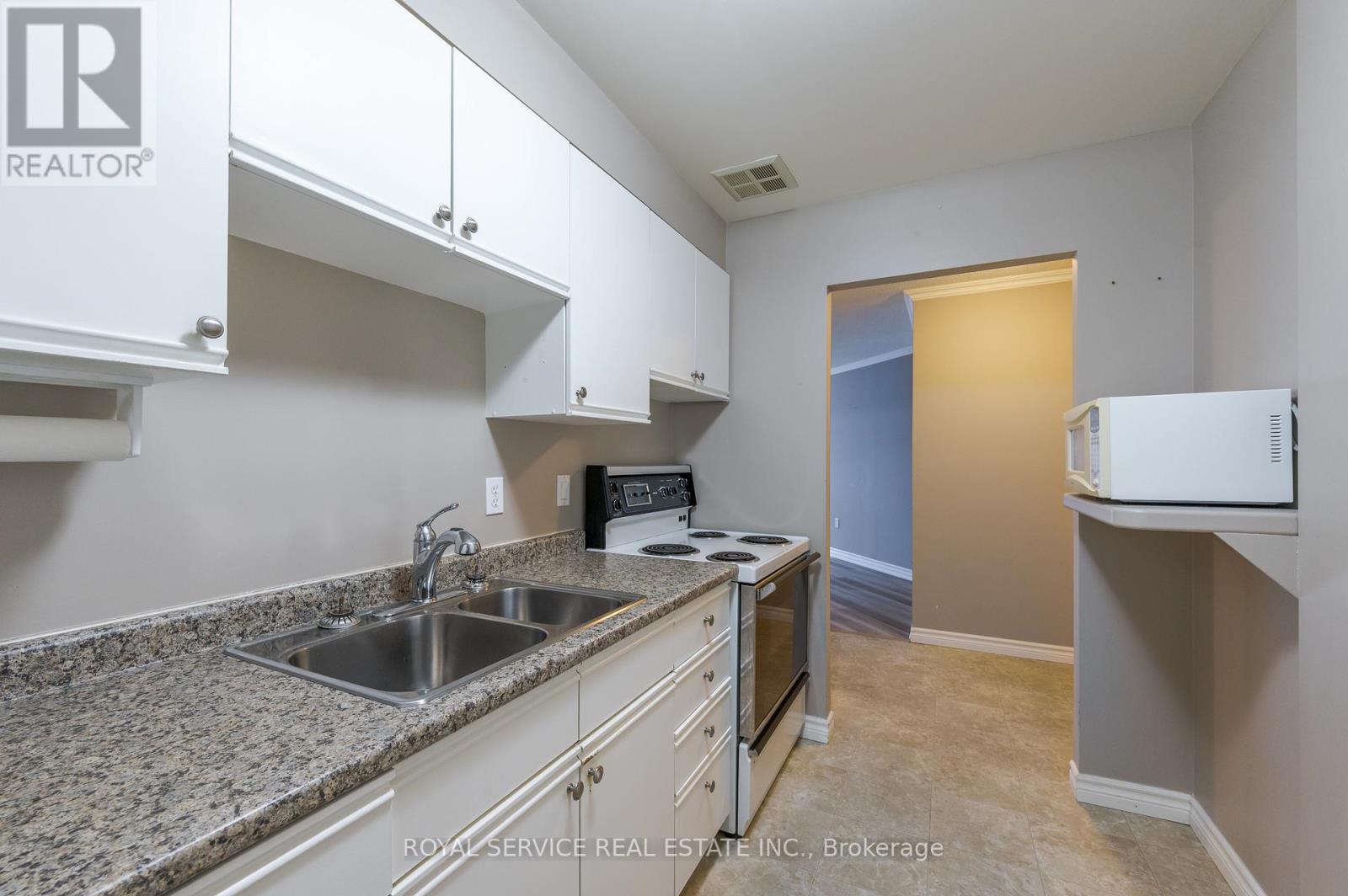 215 - 921 Armour Road, Peterborough (Ashburnham Ward 4), Ontario  K9H 7K5 - Photo 13 - X12447000