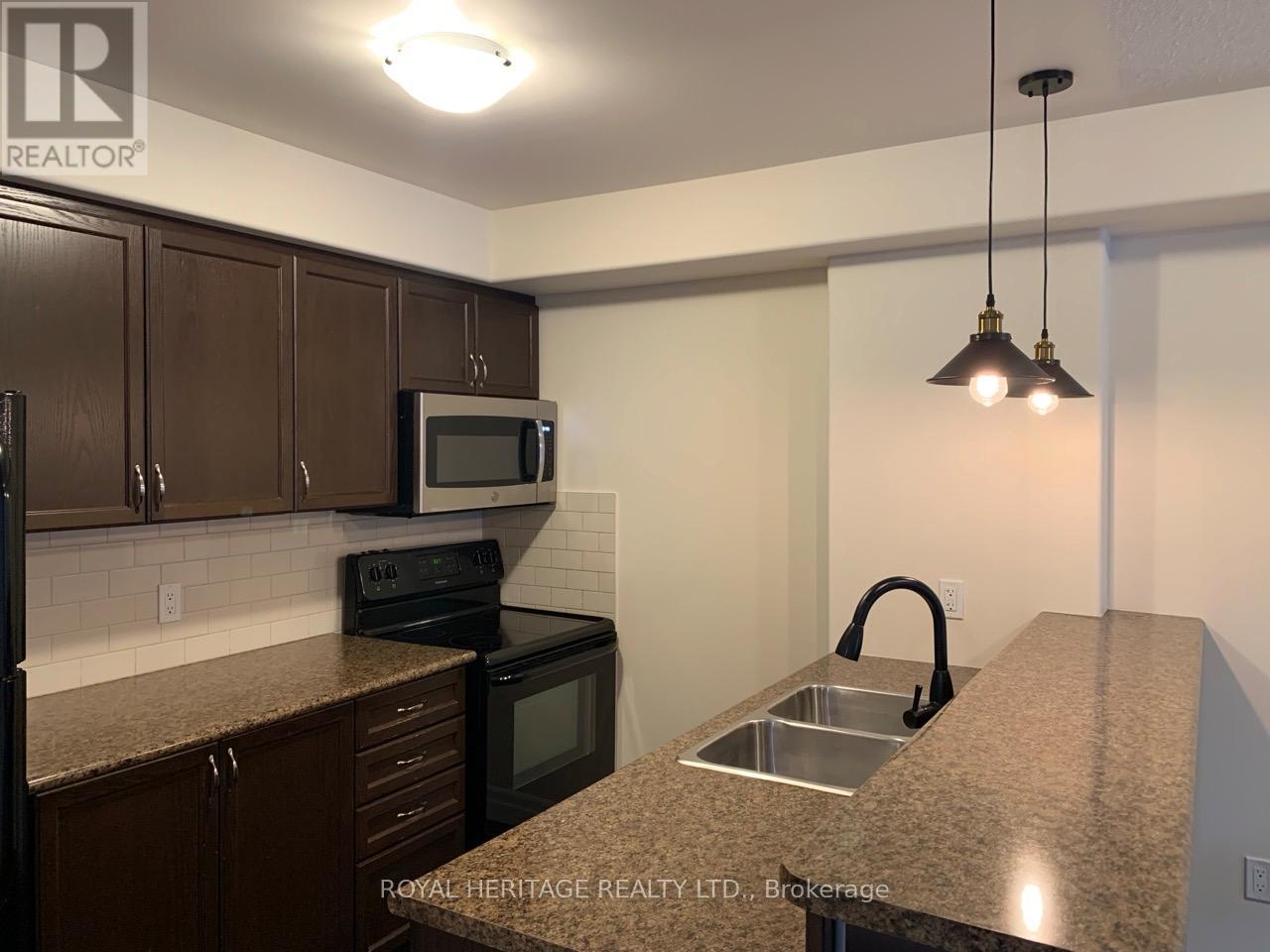 209 - 312 Spillsbury Drive N, Peterborough (Otonabee Ward 1), Ontario  K9K 0B6 - Photo 6 - X12473161