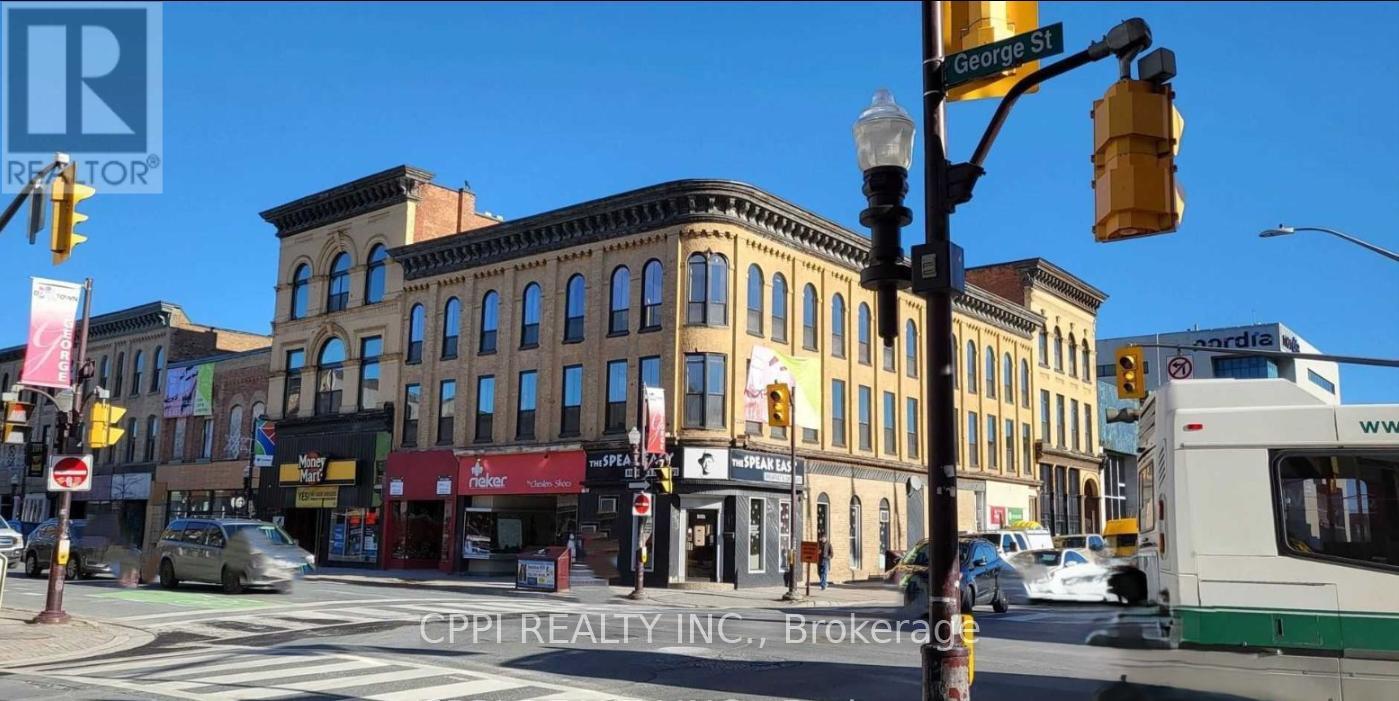 307 - 140 Simcoe Street, Peterborough (Town Ward 3), Ontario  K9H 0K5 - Photo 2 - X12517406