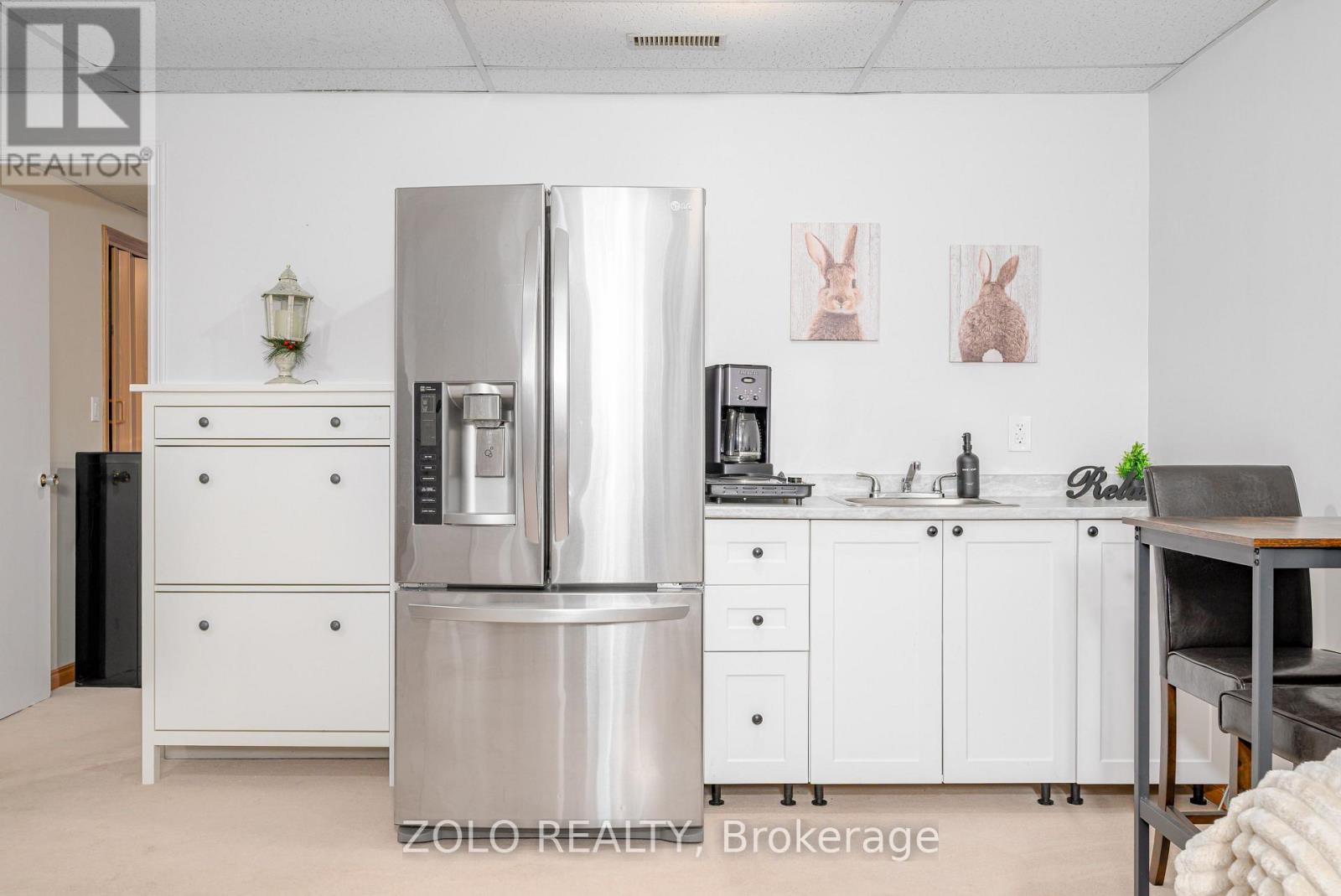 32 Andrew Drive, Kawartha Lakes (Lindsay), Ontario  K9V 5W6 - Photo 9 - X12546728