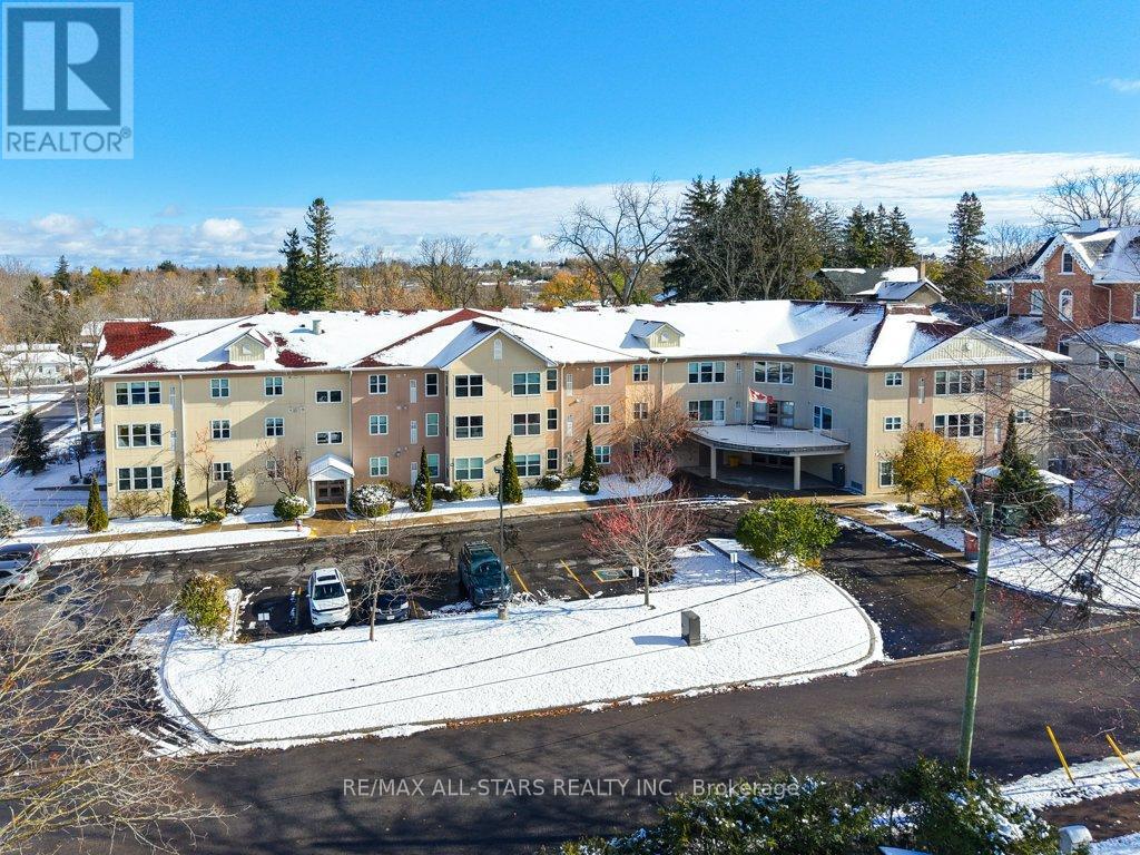 303 - 8 Huron Street, Kawartha Lakes (Lindsay), Ontario  K9V 6K3 - Photo 1 - X12548054