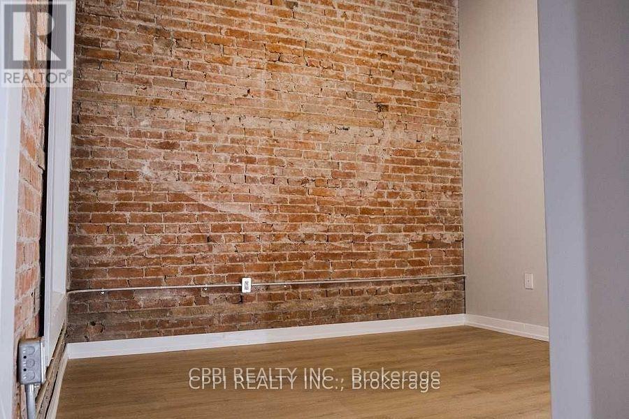 216 - 140 Simcoe Street, Peterborough (Town Ward 3), Ontario  K9H 0K5 - Photo 4 - X12664964