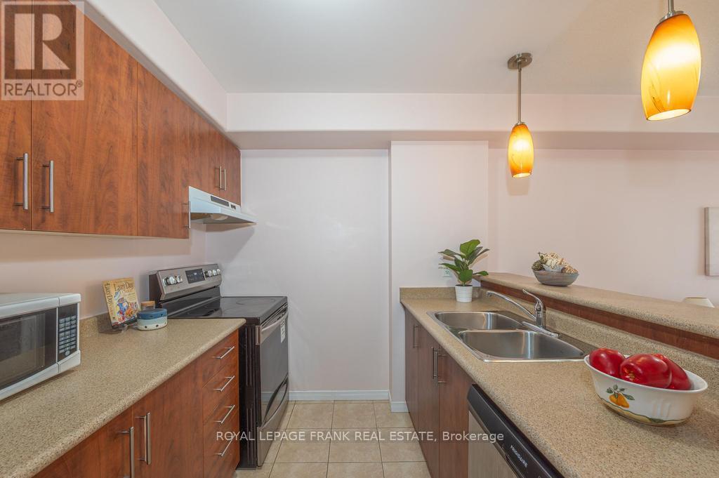 102 - 300 Spillsbury Drive, Peterborough (Otonabee Ward 1), Ontario  K9K 0B4 - Photo 9 - X12699378