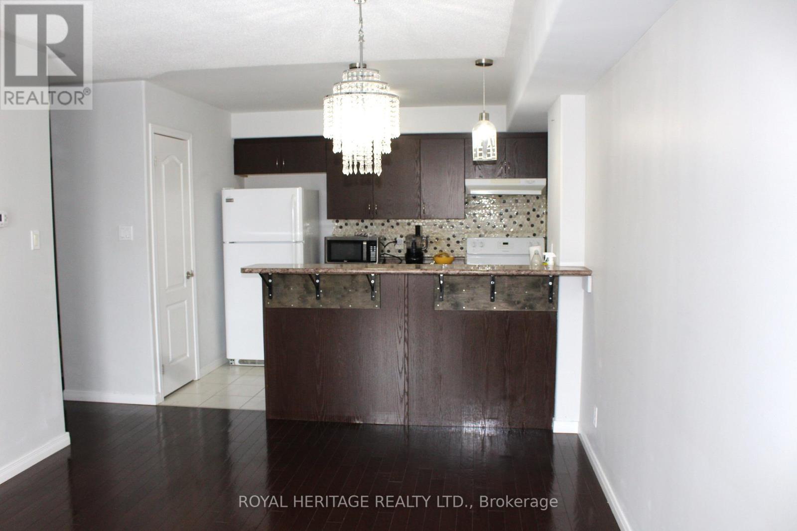 307 - 306 Spillsbury Drive, Peterborough (Otonabee Ward 1), Ontario  K9K 0B5 - Photo 4 - X12764852