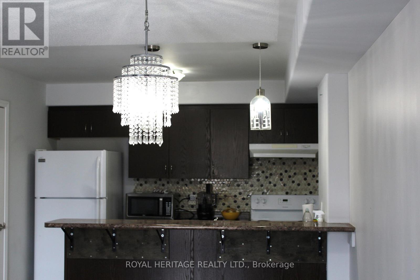 307 - 306 Spillsbury Drive, Peterborough (Otonabee Ward 1), Ontario  K9K 0B5 - Photo 5 - X12764852