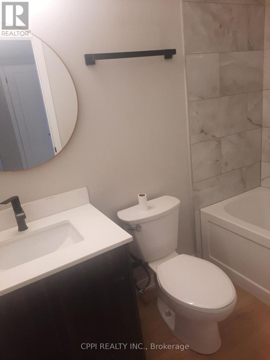 203 - 140 Simcoe Street, Peterborough (Town Ward 3), Ontario  K9H 0K5 - Photo 3 - X12856816