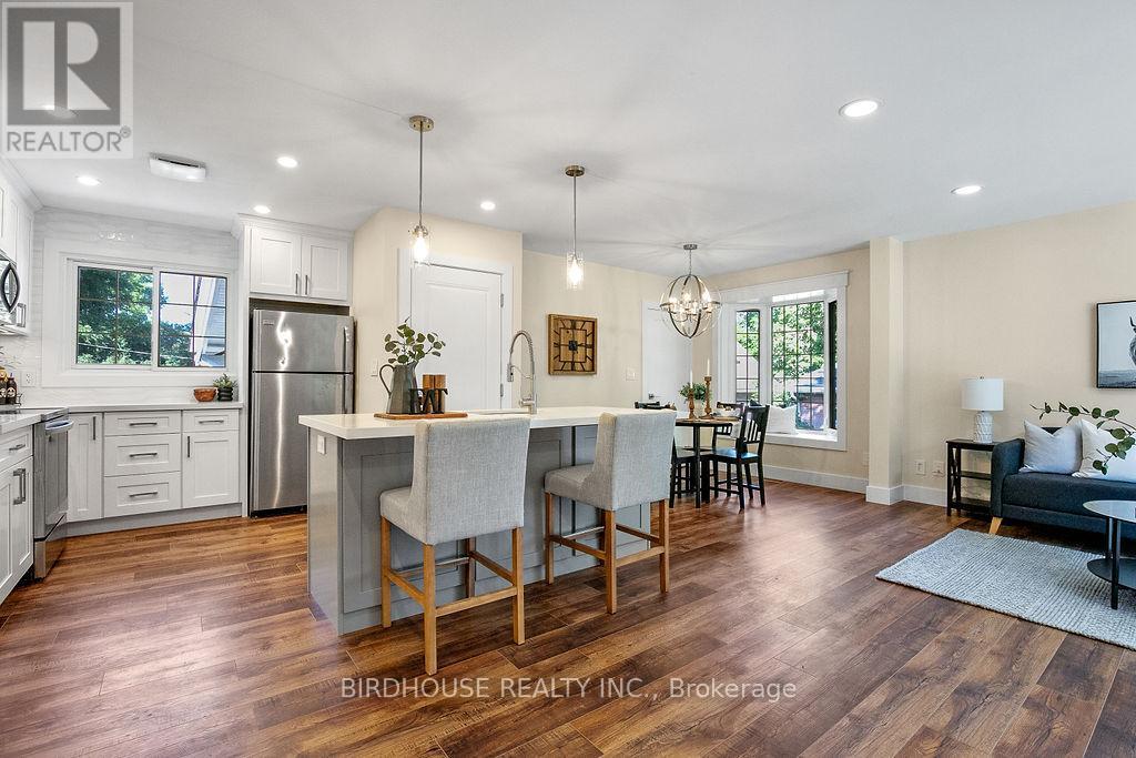 Main Floor - 813 Aylmer Street N, Peterborough (Northcrest Ward 5), Ontario  K9H 3Y3 - Photo 4 - X12971618