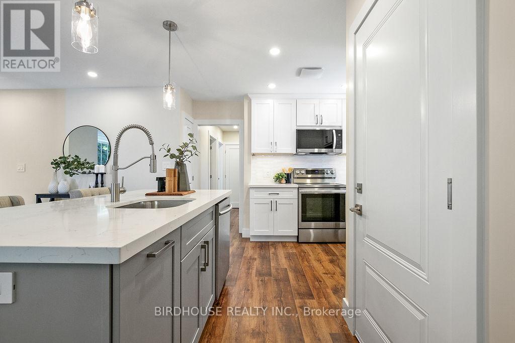 Main Floor - 813 Aylmer Street N, Peterborough (Northcrest Ward 5), Ontario  K9H 3Y3 - Photo 6 - X12971618