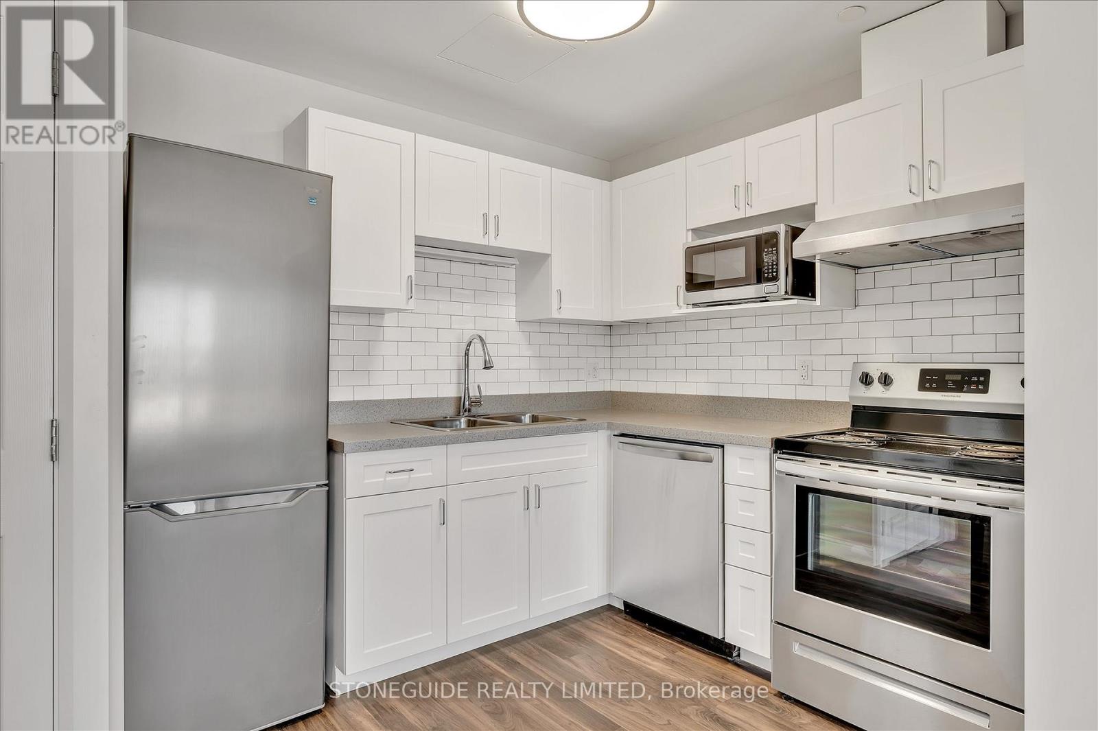 421 - 555 Bonaccord Street, Peterborough (Town Ward 3), Ontario  K9H 2X8 - Photo 2 - X13079374