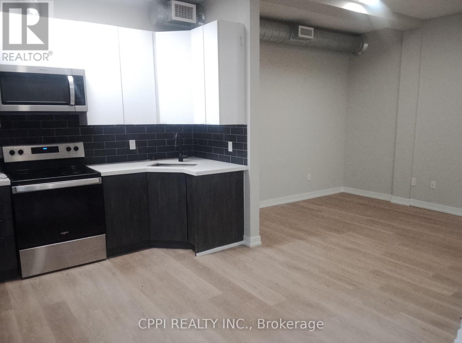 223 - 140 Simcoe Street, Peterborough (Town Ward 3), Ontario  K9H 0K5 - Photo 2 - X13113514