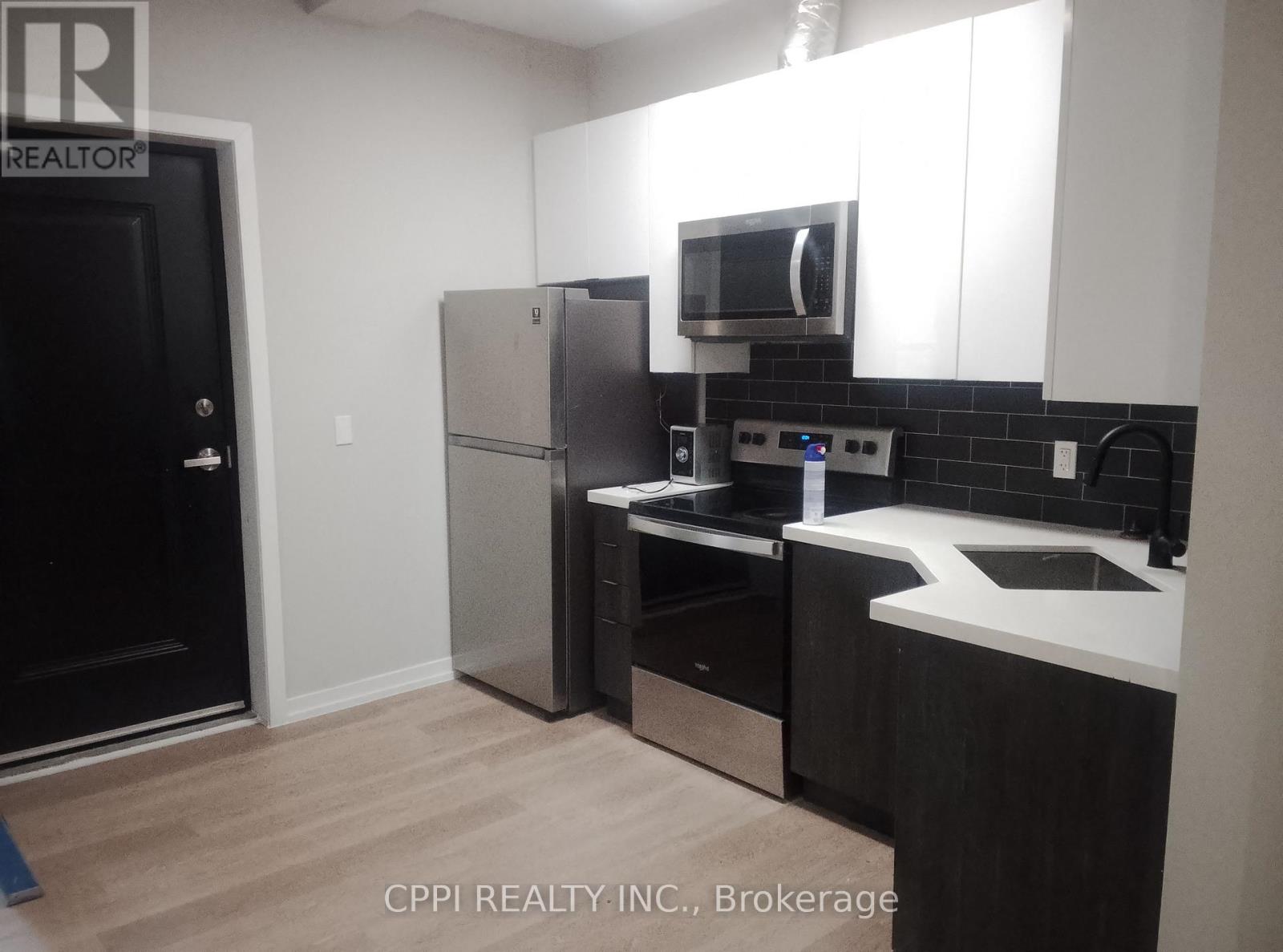 223 - 140 Simcoe Street, Peterborough (Town Ward 3), Ontario  K9H 0K5 - Photo 3 - X13113514