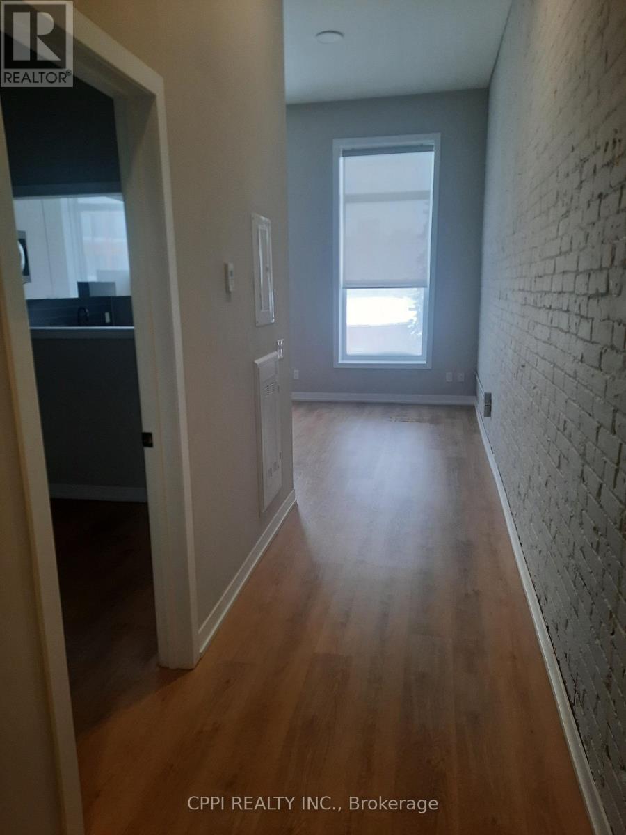 208 - 140 Simcoe Street, Peterborough (Town Ward 3), Ontario  K9H 0K5 - Photo 2 - X13114314