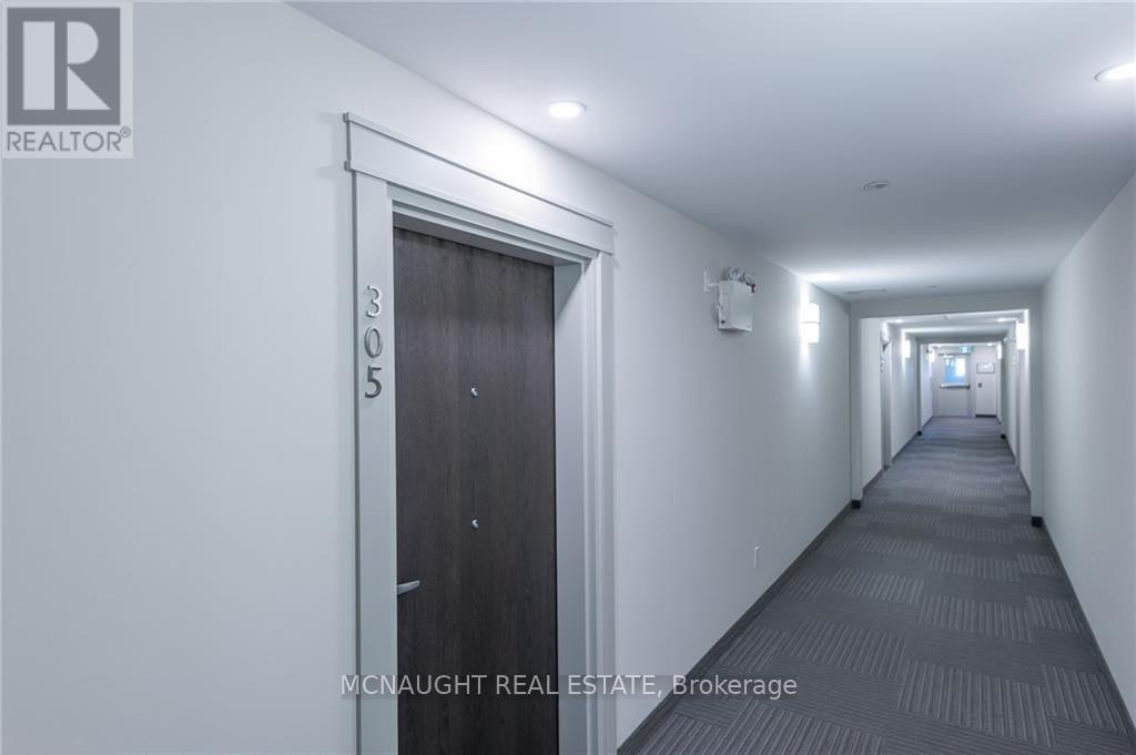 305 - 340 Florence Drive, Peterborough (Monaghan Ward 2), Ontario  K9J 6X4 - Photo 3 - X13426158
