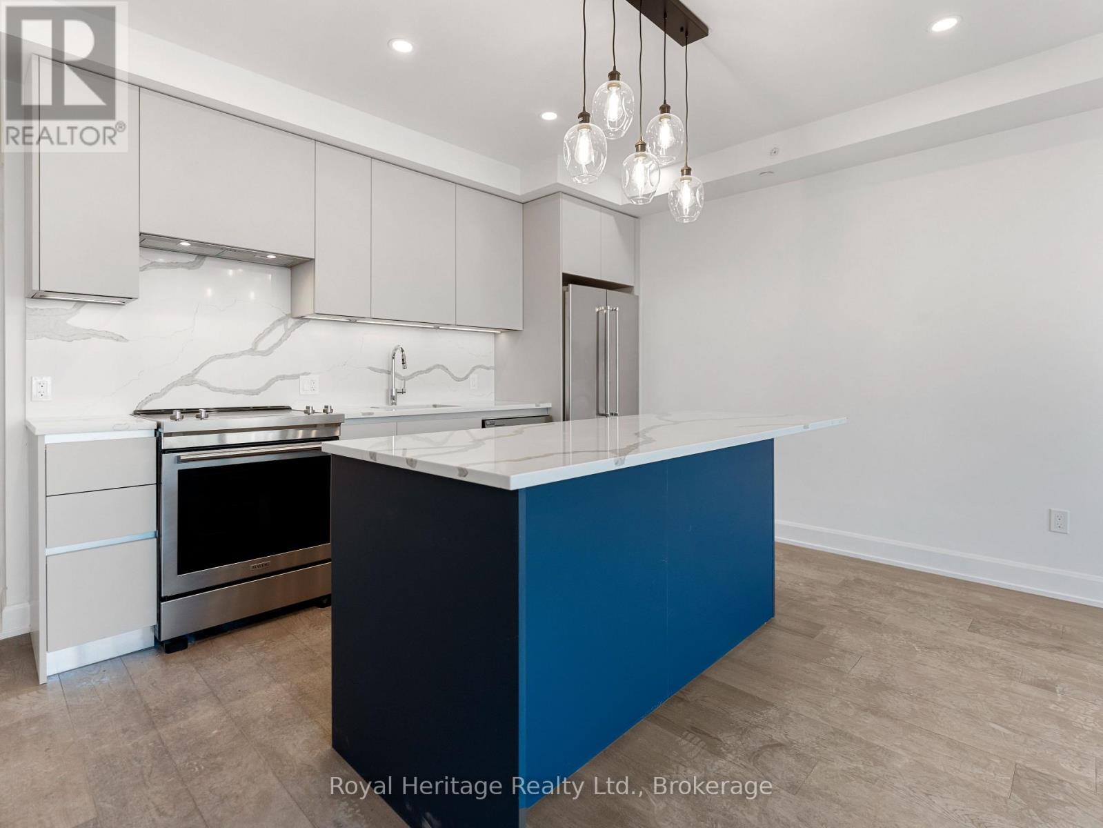 407 - 195 Hunter Street E, Peterborough (Ashburnham Ward 4), Ontario  K9H 0K6 - Photo 2 - X13594904