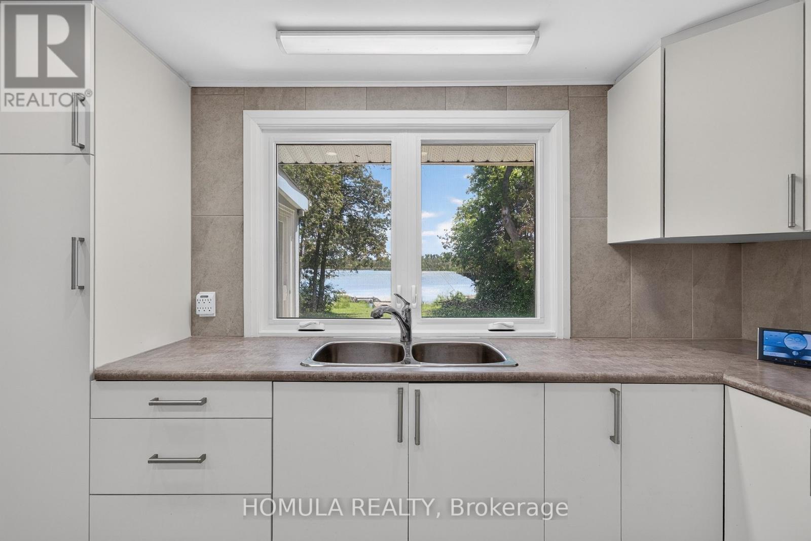 24 Riverside Drive, Kawartha Lakes (Ops), Ontario  K9V 0H6 - Photo 18 - X13763908