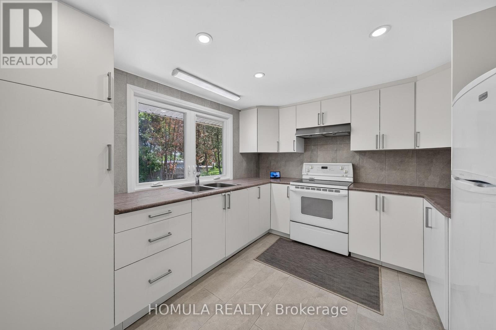 24 Riverside Drive, Kawartha Lakes (Ops), Ontario  K9V 0H6 - Photo 20 - X13763908